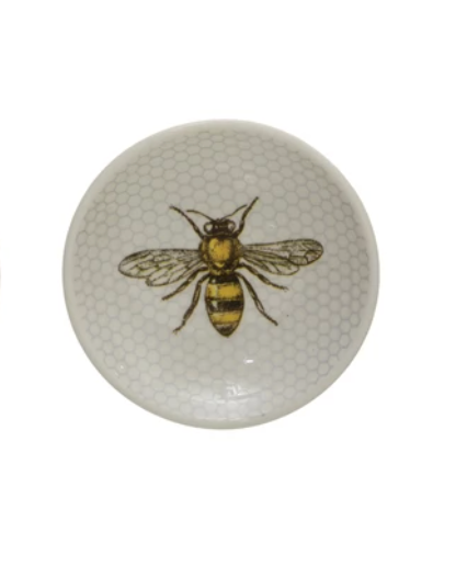 Stoneware dish with bees and honey