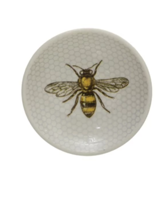 Stoneware dish with bees and honey